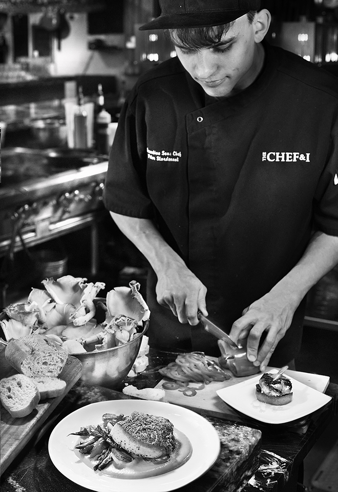 Young Chef preparing Pumpkin Swordfish at The Chef and I restaurant in Nashville Tennessee