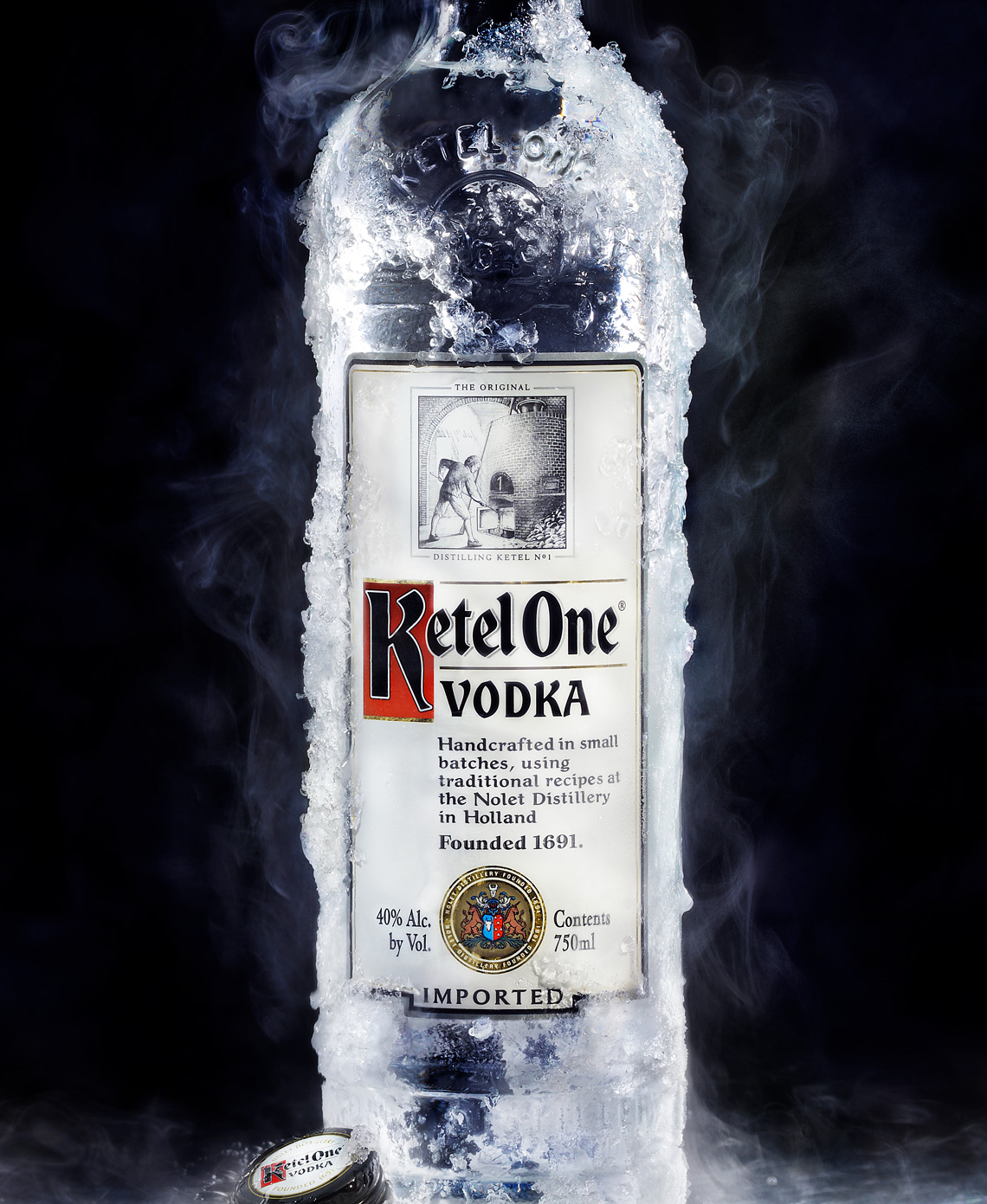 Frozen iced steaming bottle of Ketel One Vodka shot for Diageo