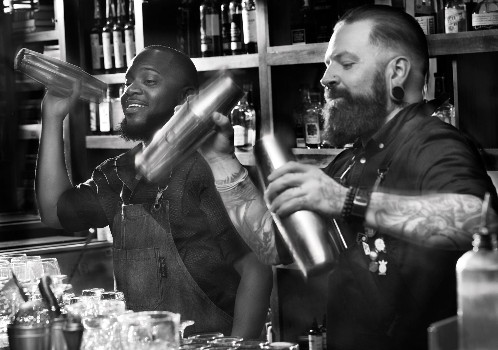 Bartenders shaking cocktails at Sinema Restaurant in Nashville Tennessee
