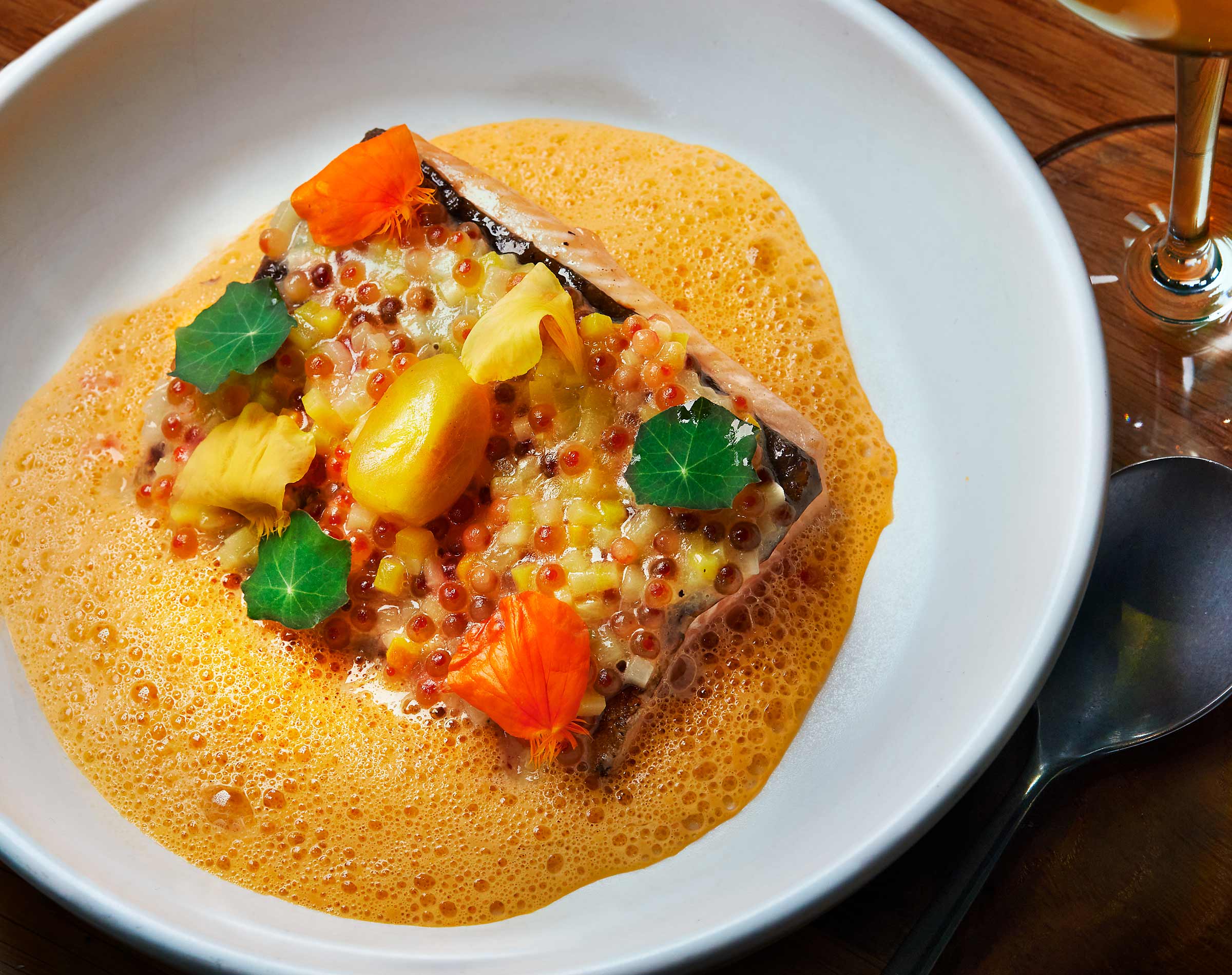 Trout with tomato gravy, caviar, zucchini & squash 