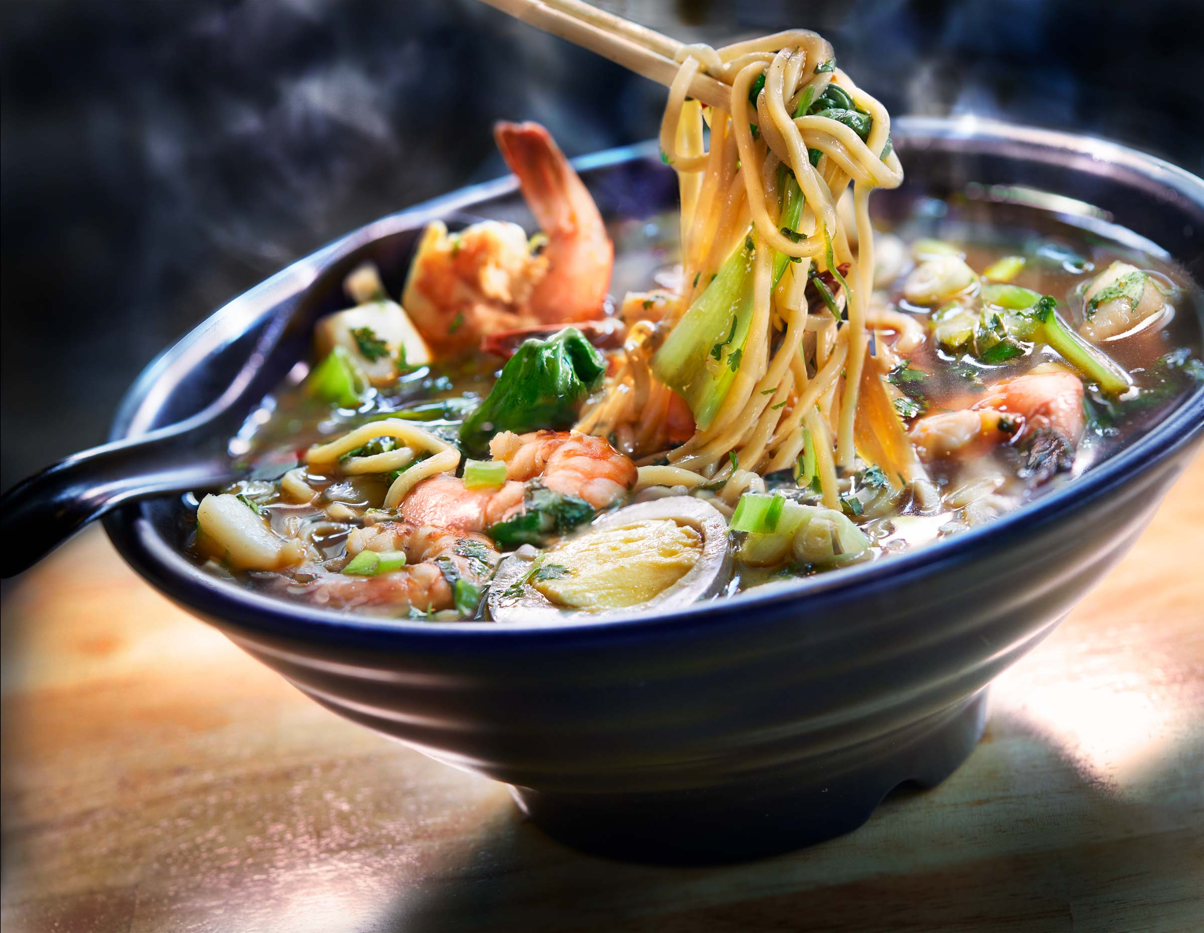 Seafood Noodle Soup,  beef bone broth, shrimp, scallops, egg, green onions, cilantro, baby bok choy at Steam Boys