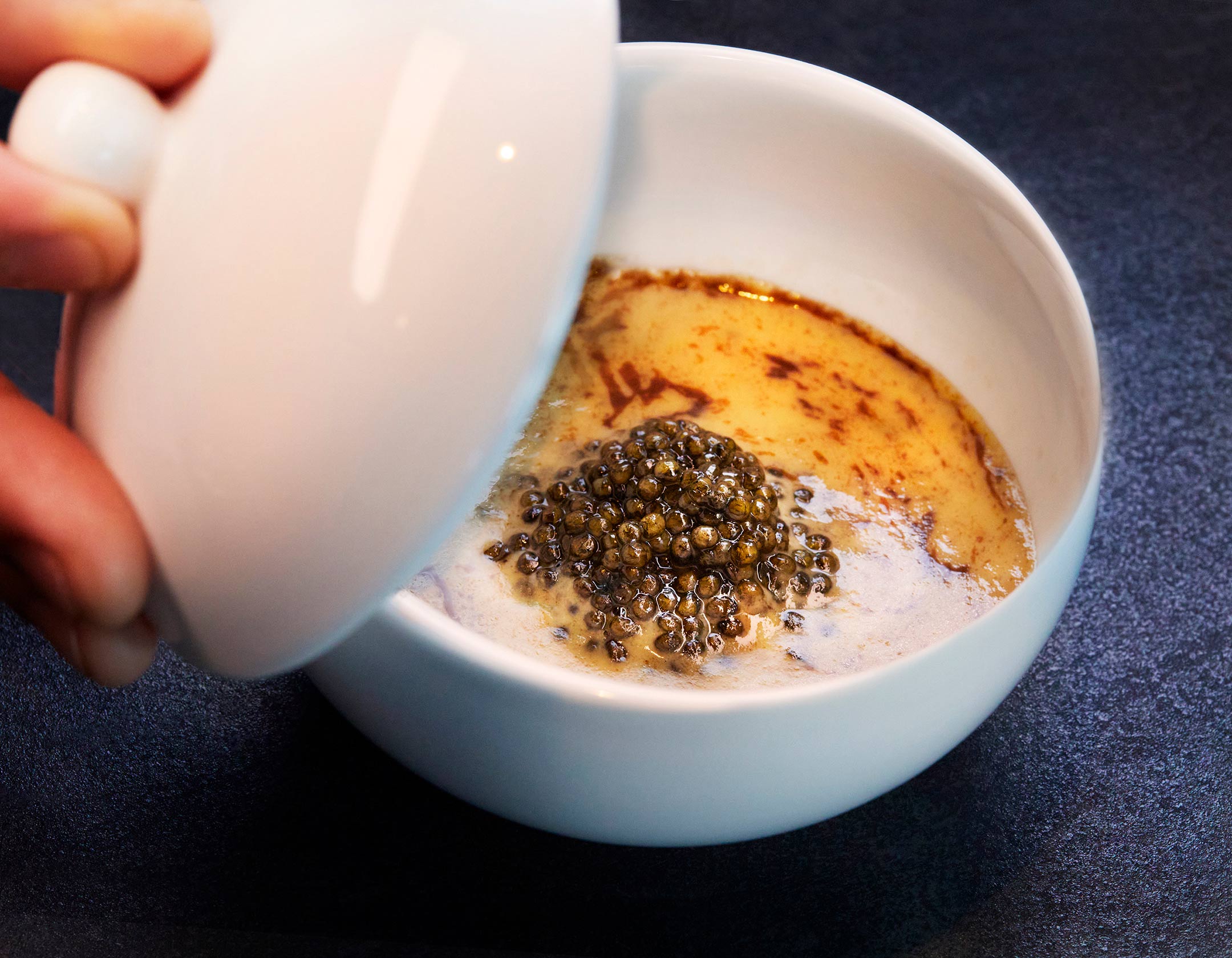 A warm custard of parsnip served along side Royal White Sturgeon and grilled runner peanut oil pressed by The Lab at Audrey Nashville